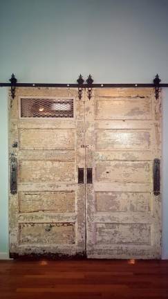 The doors hang between our living room and den, reminders of what we can do when motivated by empathy.