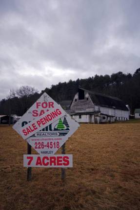 Pending: upscale condos or community farm?