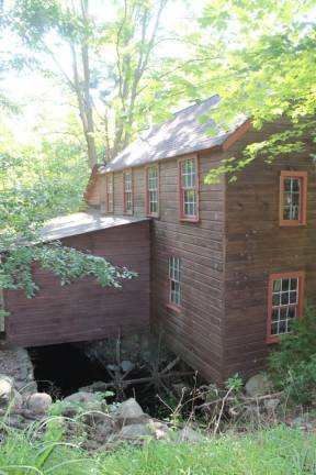 The waterwheel, which still sits poised above the millstream, was the inspiration for the Rinaldi family restaurant: the Waterwheel.