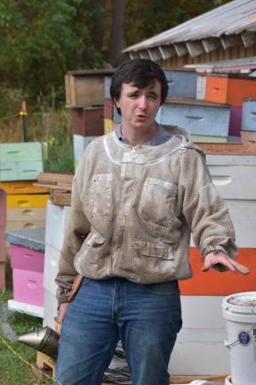 The EpiPen kid Harrison in his new bee yard in Newton, NJ on an unseasonbly warm day in October. On a beautiful, sunny day, you’re less likely to “get lit up.”