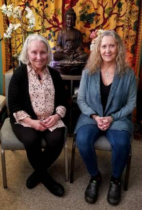 Retired nurse Linda Mitchell, left, with partner Debra Hollinrake at The Tree of Health Center