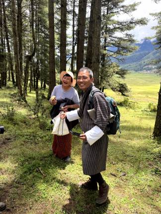 A mushroom hunter’s Shangri-La Our guide Ugyen having a jolly laugh with a local mushroom forager in Phobjhika Valley.