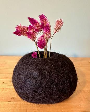 Zen and the art of felting a sunflower A vessel Torino made from the wool of a black sheep.