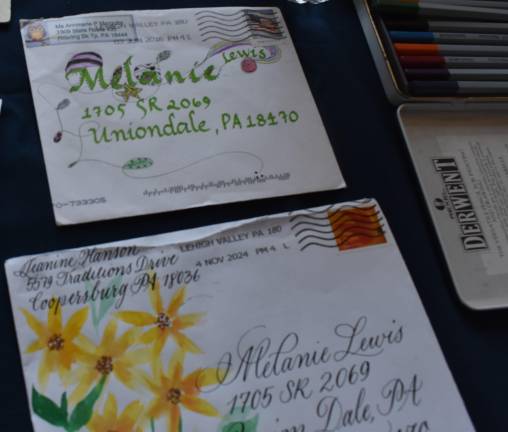 Script is far from dead Hand-lettered envelopes on display at the calligraphy demonstration at the Pike County Public Library in Milford Aug. 15.