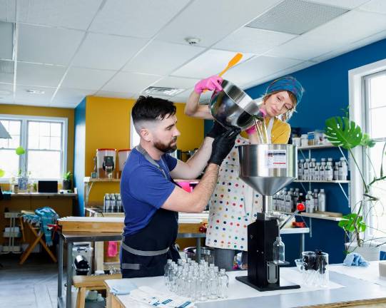 Matt and Thena Donnelly blending oils in their new space in Warwick.