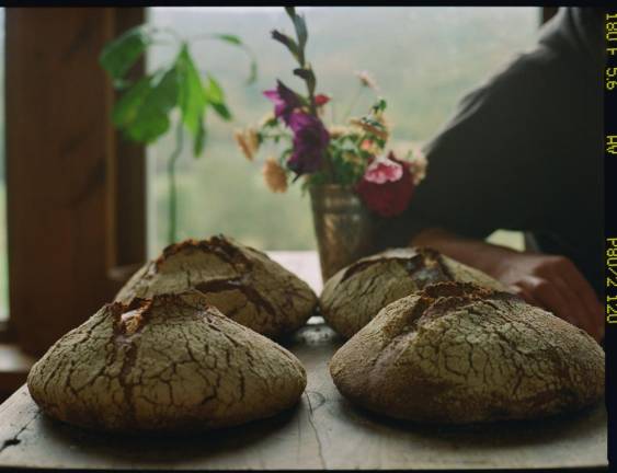 Matt bakes sourdough bread, which they sold at a local country market.