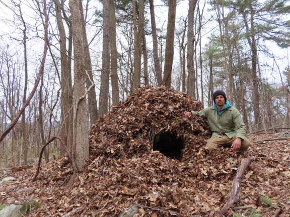 A debris shelter that Fisher built and slept in during quarantine.