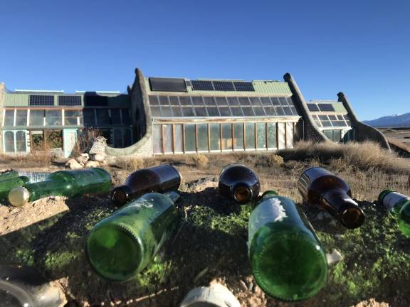 The Earthship Academy building.