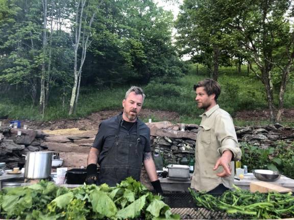 Prepping food for a family dinner. Some meals were served at tables, some were ordered by a counter at the clay oven, where you would collect it when it was done and sit on a blanket or in the grass.