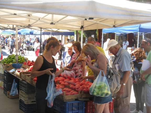 A Friday farmers market where about 70 farmers were selling vegetables, cheeses, eggs and more.