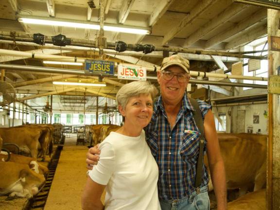 Rick and Julie Vreeland with their herd at Freedom Hill Farm.