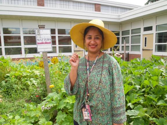 Principal Ferzeen Shamsi in the courtyard garden at Claremont Elementary, Ossining NY.