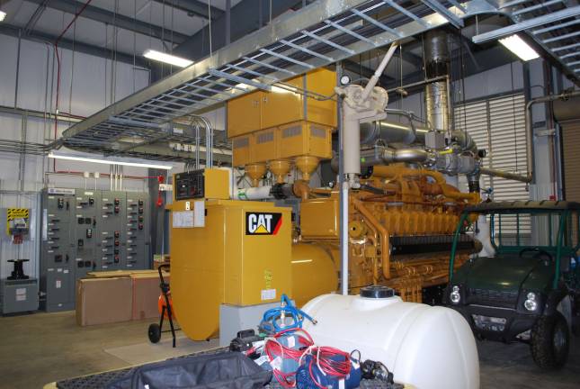 Trash lights 1000 houses Two Caterpillar engines turn methane into electricity, which is then sold into the grid.