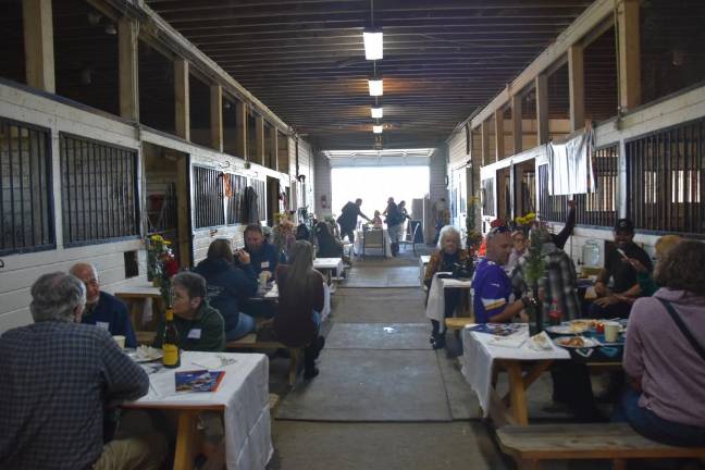 Guests enjoying the food at the barnfest.