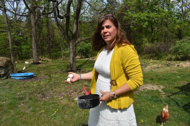 Coop dreams Gilda Burke collects eggs and feeds her chickens scratch. She has a waiting list 15 deep for her eggs, which she sells at $5 a dozen.