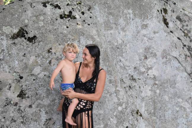 Assaraf and her son, 2, outside their lakehouse in Sparta, NJ