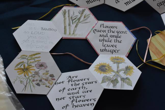 Script is far from dead A piece featuring watercolor vignettesa and calligraphy quotes was among the guild work on display at the Pike County Public Library.