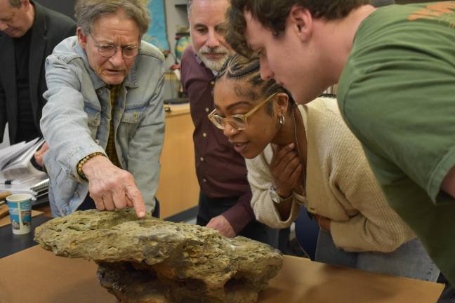 Cracking open deep time Daniel Grant, a sculptor, points out signs of ancient life to SUNY Orange students before cracking open the 93-pound fossil he found in his yard in Westtown, NY.