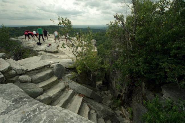 Visitors practice tai chi on the newly accessible bluff