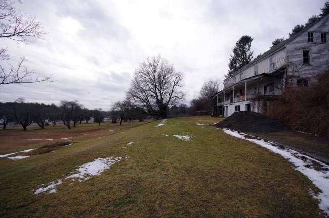 Pending: upscale condos or community farm?