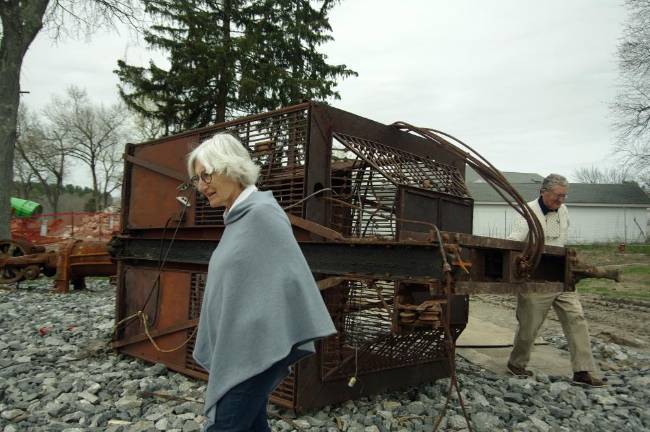 Ann Gifford and Charlie Pierce, of the Millbrook Community Partnership, wander the old school grounds.