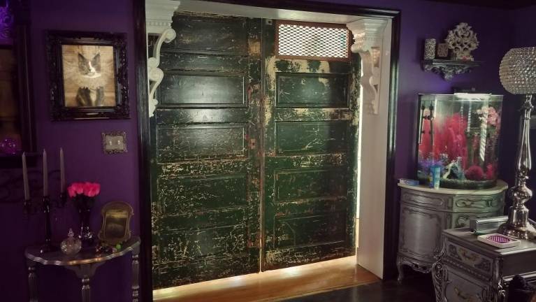 If these doors could talk The doors, at long last, scraped, varnished and hung.