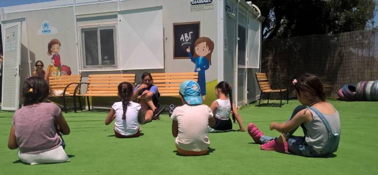 The author leading her class in stretching.