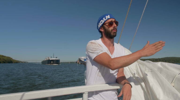 Sam Merrett talkign through sail set before hoisting the sails.