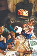 J’avail Haltom and her four children are pictured in the off-grid homestead of the book’s creative stylist, Lena Masur, in Upstate New York where the book was photographed.