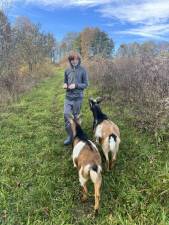 The writer’s son, 12, with his goats. His PowerPoint presentation clearly hit its mark.