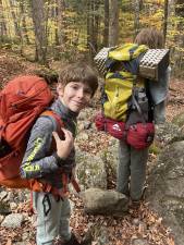 Eli, 11 (front) and his older brother Able, 14, went on without their parents to summit two more Adirondack peaks.