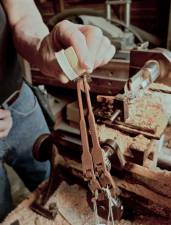 Ray compares the old and new piano hammers.