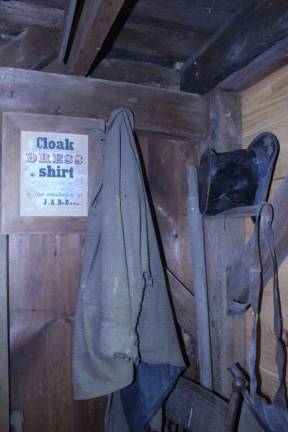 John DeBaun’s coat, hanging where he left it over a century ago.