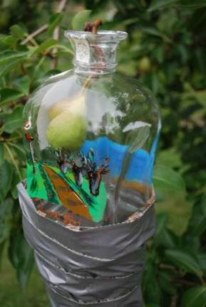 Jack Kaczynski, who tends the orchard, tapes bottles onto the pear trees in such a way that the pear will grow inside the bottle, creating a sort of ship-in-the-bottle effect. Later, he&#x2019;ll fill the bottle with vodka.