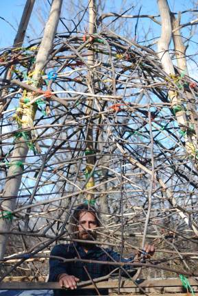Manza in front of his tipi in progress. &#x201c;The tipi is the most efficient building system there is,&#x201d; he said.