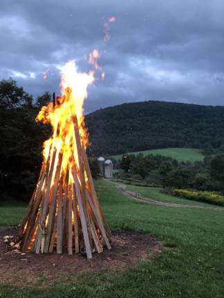 A bonfire on Caver Farrell’s farm in his hometown of Bovina, NY.
