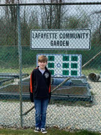Troy in front of the Lafayette Community Garden