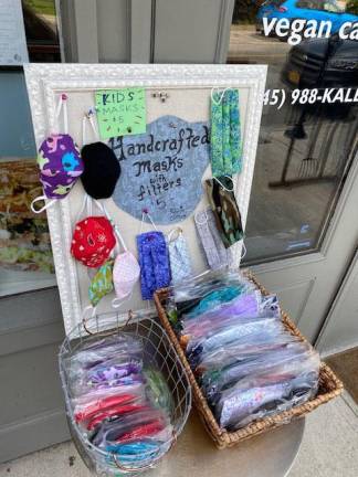 Locally made masks are for sale outside Conscious Fork in Warwick. All the proceeds go to the two makers: Claire Gabelmann, who is involved in local charities that work with migrant worker families, and Brianna Chinas, a ninth-grader who is making youth masks on her mom’s sewing machine.