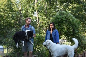 Pat Scott and Soham Dhesi with dogs Kimchi and Pickles. Fermentation is a major theme on their homestead.