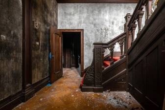 The newel post in the abandoned Cenacle in 2019