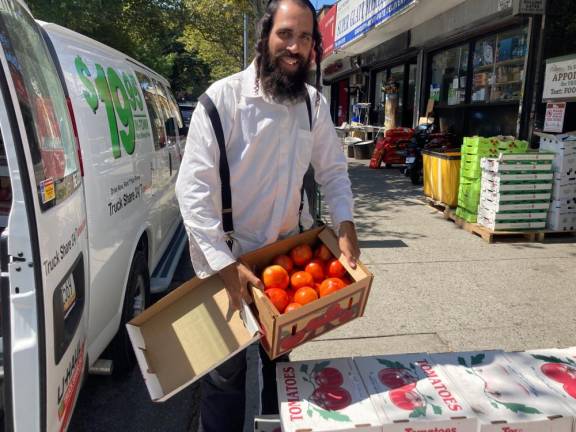 From field to soup kitchens, van loads of tomatoes