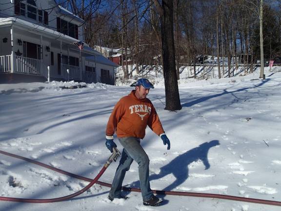 Vinny D'Attolico, of D'Atollico Organic Farm, drives a fuel oil delivery truck in the winter.