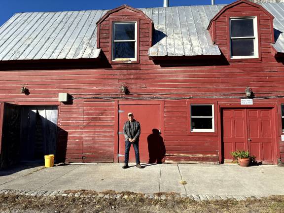 Lewis outside the barn that houses his milling operating in Dutchess County, NY.