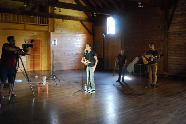 The Hansons of bluegrass shoot video in barn