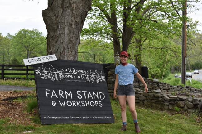 Alix, an architect, hand-painted all the farm signage herself.