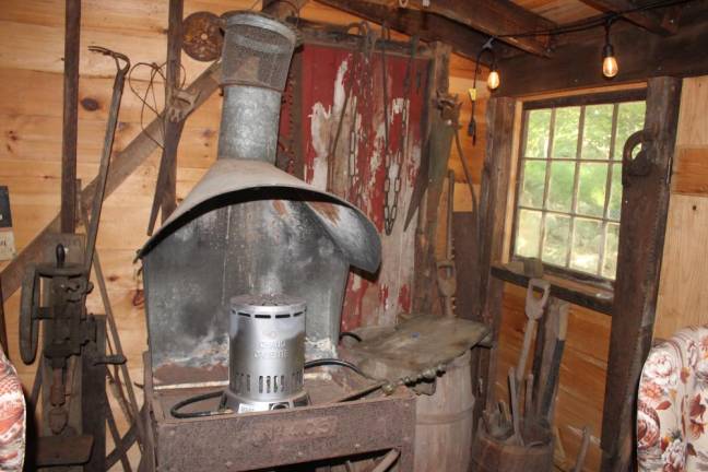 John DeBaun’s blacksmithing tools hang where he left them more than a century ago.
