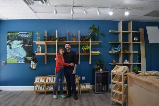 Matt and Thena Donnelly in their new space in Warwick, which Matt and his dad fitted out with handmade shelving and furniture.