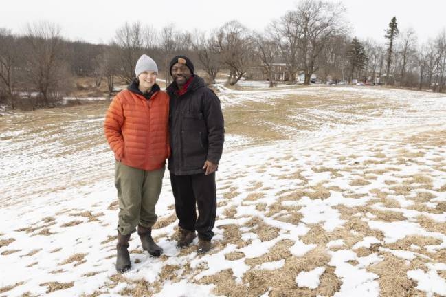 Edgar Hayes and Ann Rader walk the grounds of Freedom Farm Community in Otisville NY.
