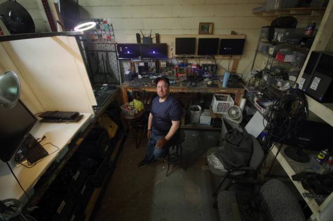 David Cabrales in his “corner office” in a warehouse in Linden, NJ.
