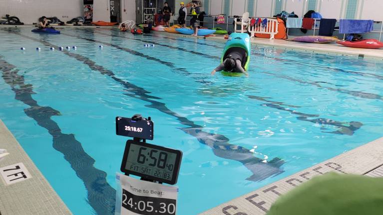 Scelba sets a Guinness World Record for longest bow stall in January at the Boys &amp; Girls Club of Passaic.